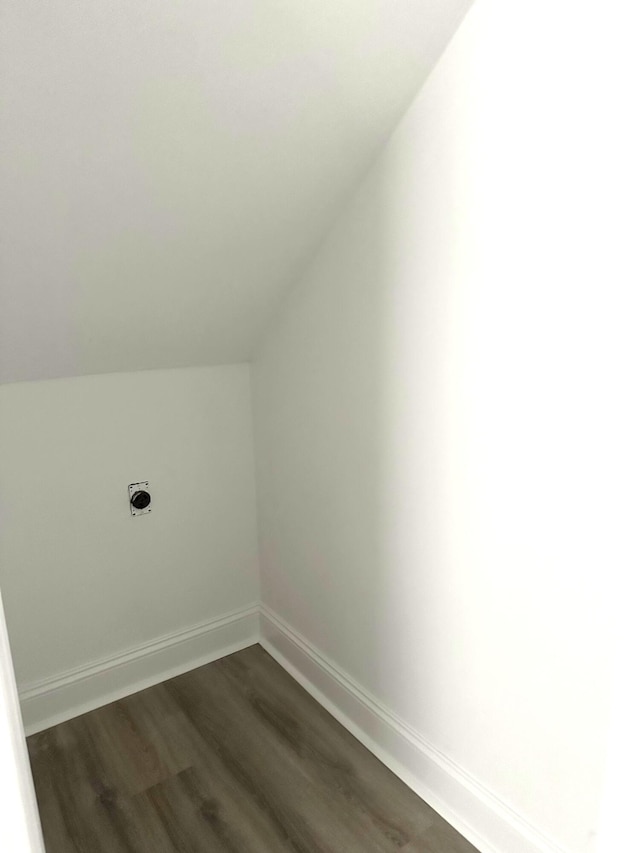 laundry room featuring hookup for an electric dryer and dark hardwood / wood-style flooring