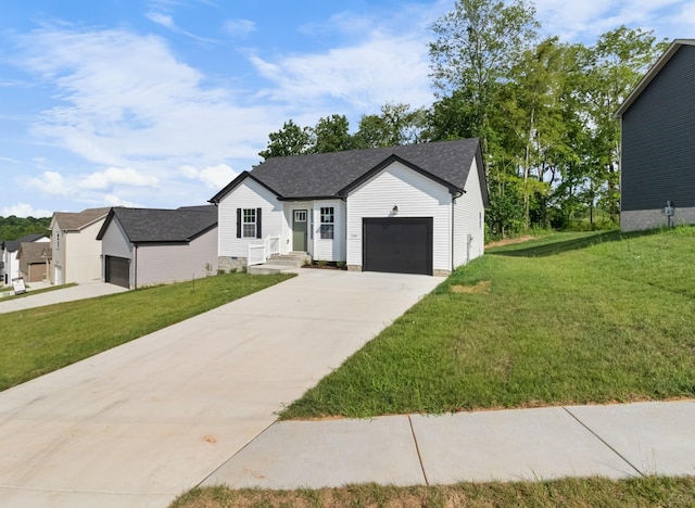 view of front of property featuring a garage and a front yard