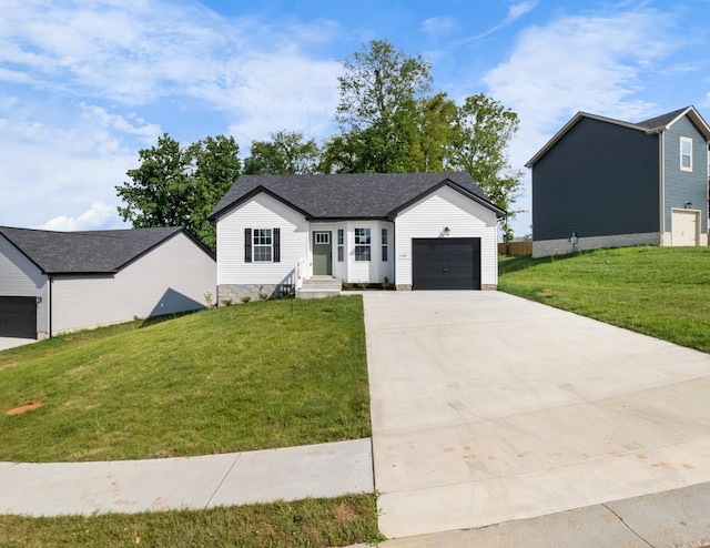 view of front facade featuring a front yard and a garage