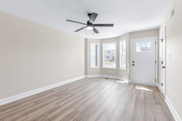 foyer featuring ceiling fan and light hardwood / wood-style floors