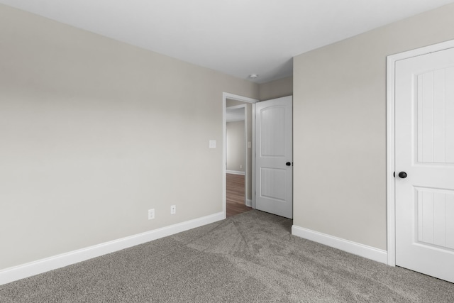 unfurnished bedroom with carpet floors