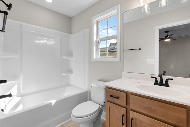 full bathroom featuring vanity, toilet, shower / washtub combination, and ceiling fan