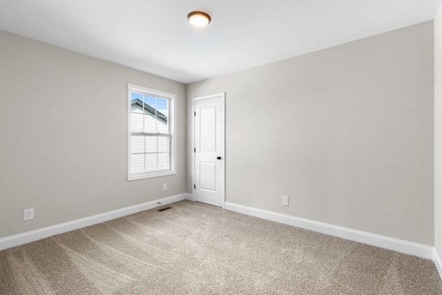 view of carpeted spare room