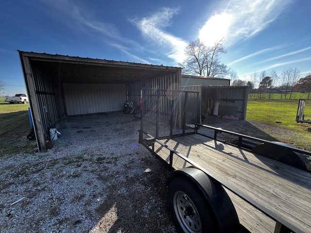 exterior space with a yard and a carport