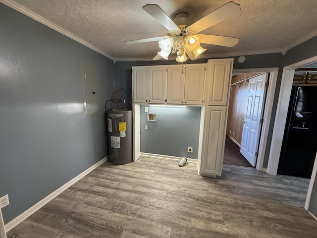 kitchen featuring hardwood / wood-style floors, electric water heater, black refrigerator with ice dispenser, crown molding, and ceiling fan