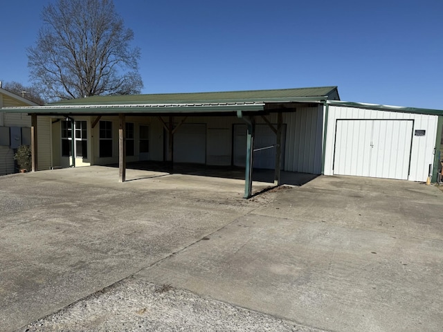 rear view of house with a carport