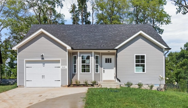 single story home featuring a garage