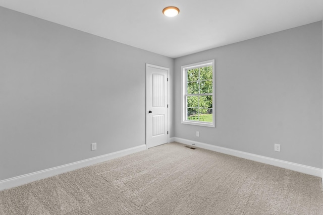 empty room with carpet floors