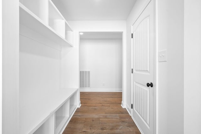 mudroom with dark hardwood / wood-style flooring