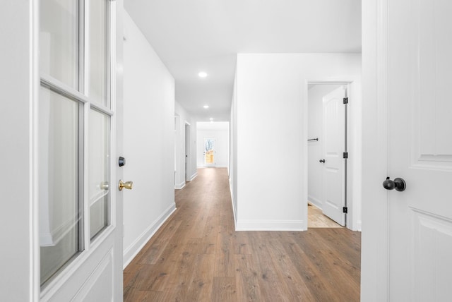 hallway featuring light wood-type flooring