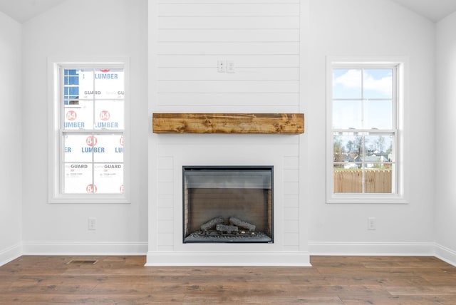 interior details featuring hardwood / wood-style floors