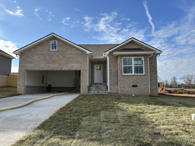 view of front of house featuring a garage and a front lawn