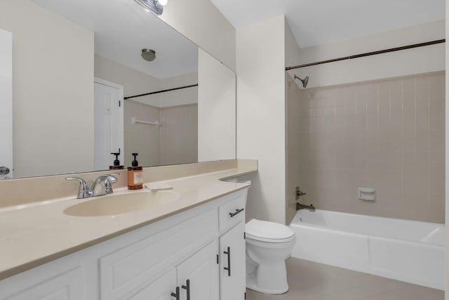 full bathroom with vanity, tiled shower / bath combo, and toilet