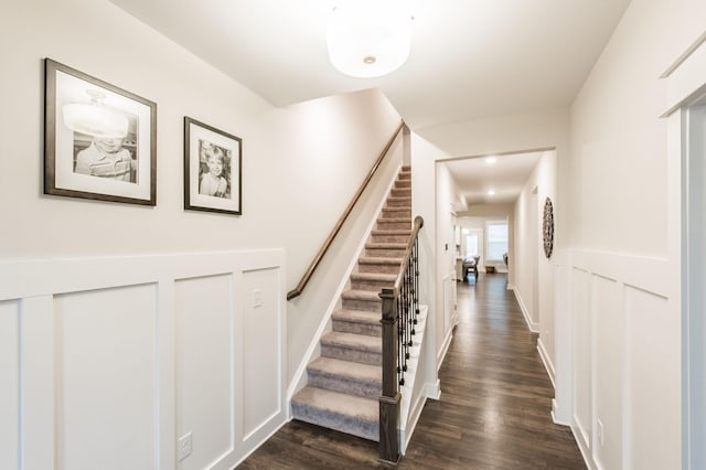 stairs with wood-type flooring