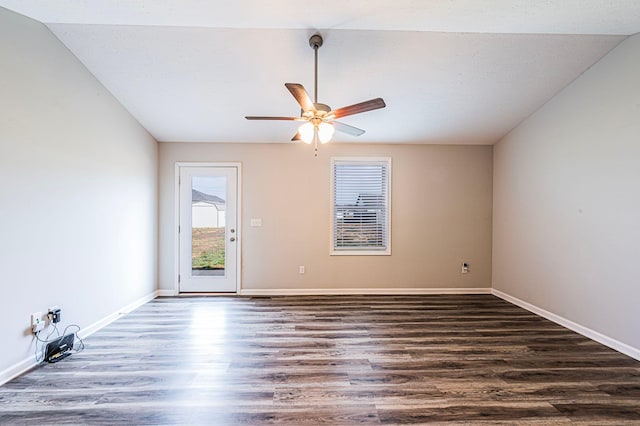 spare room with dark hardwood / wood-style floors and ceiling fan