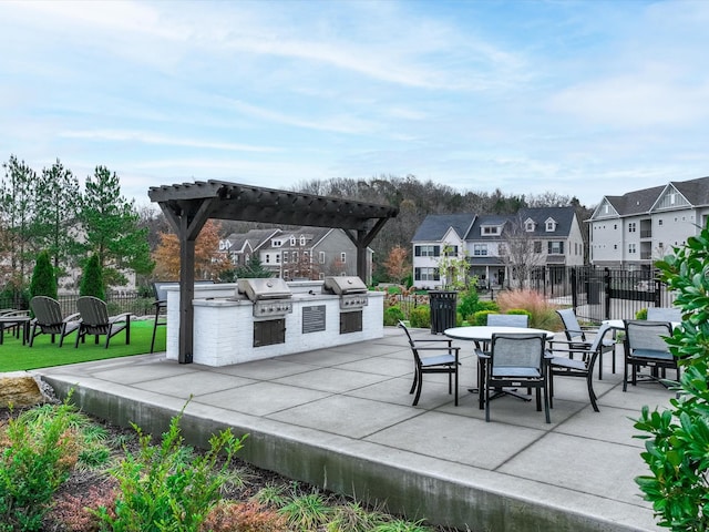 view of patio / terrace featuring an outdoor kitchen, area for grilling, and a pergola