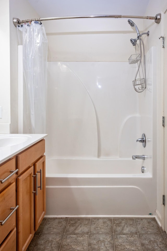 bathroom with vanity and shower / tub combo