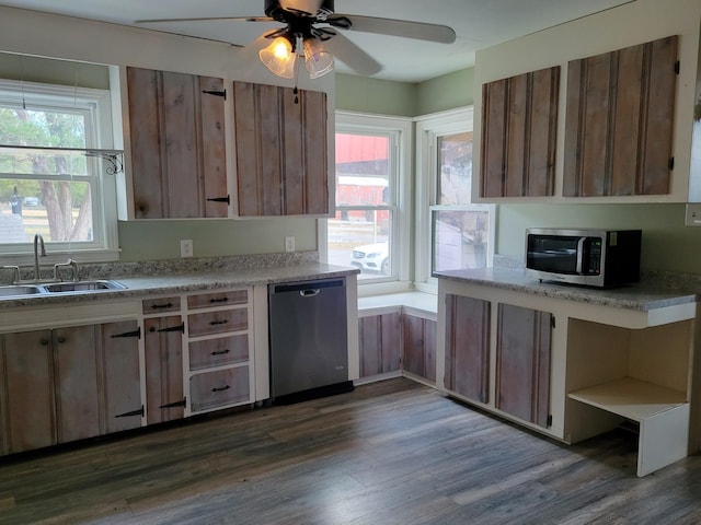 kitchen with ceiling fan, stainless steel appliances, a wealth of natural light, and sink