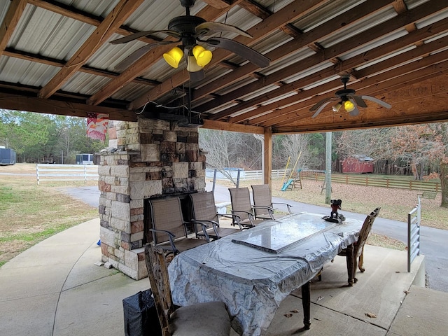 view of patio / terrace with an outdoor stone fireplace