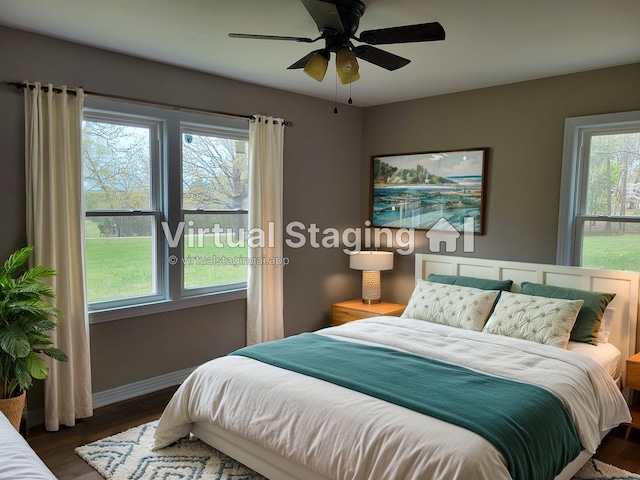 2228 Granny Wright Ln, Hermitage, TN 37076 - bedroom with dark wood-style flooring, baseboards, and ceiling fan