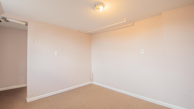 empty room featuring carpet flooring