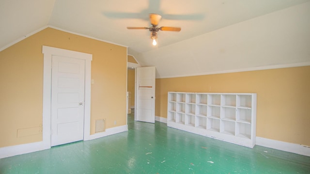 bonus room with ceiling fan and vaulted ceiling