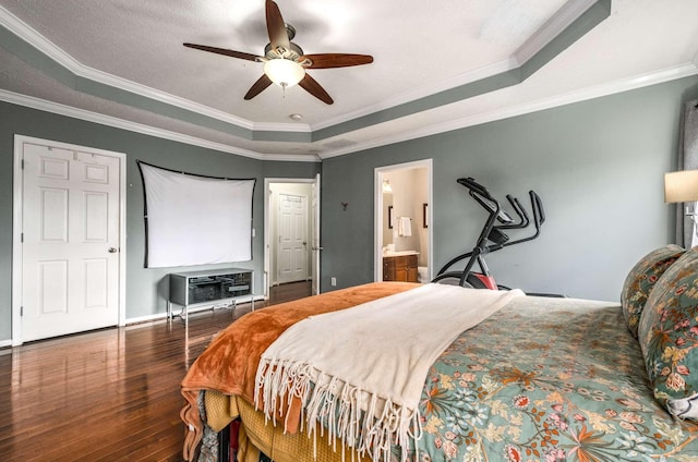 bedroom featuring dark hardwood / wood-style floors, ceiling fan, and ornamental molding