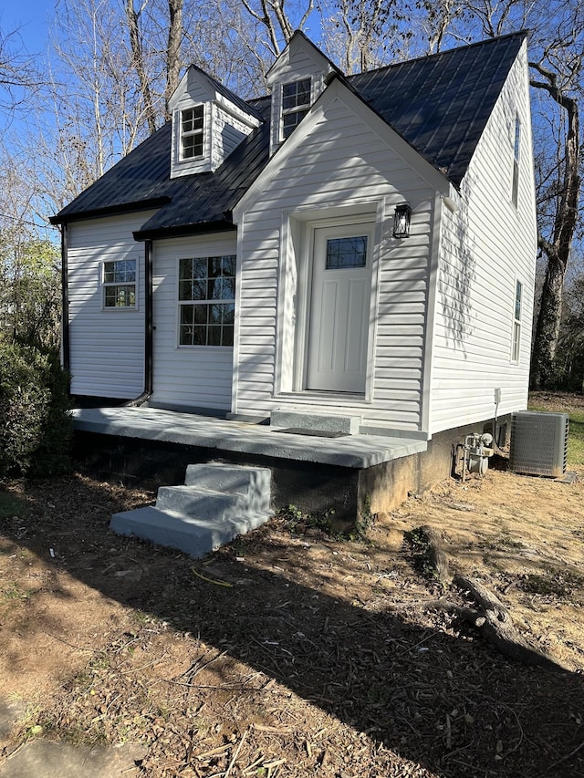 view of front of house with central AC unit