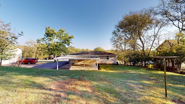 view of yard with a carport