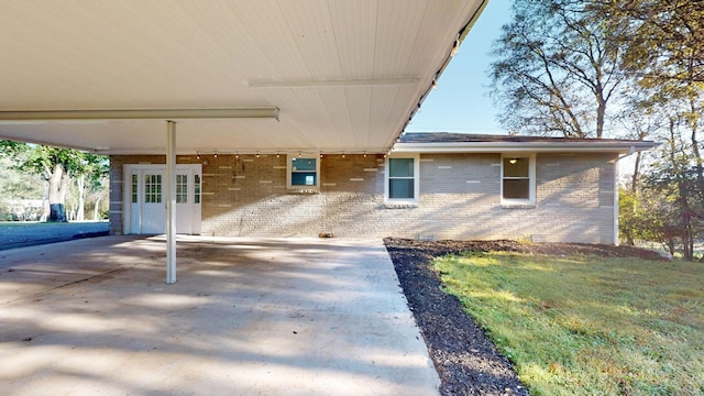 view of patio / terrace featuring a carport