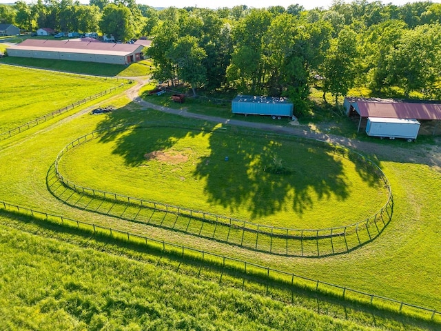 birds eye view of property with a rural view