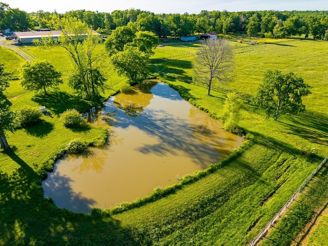 birds eye view of property featuring a rural view and a water view