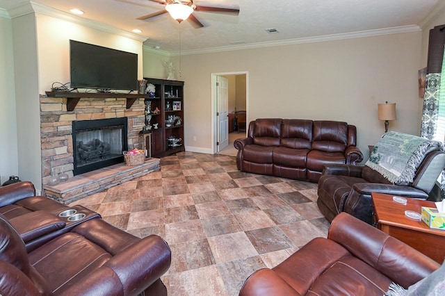 living room with crown molding, a fireplace, and ceiling fan