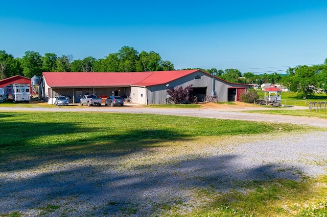 ranch-style home with a front lawn and a carport