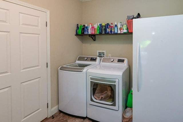 laundry room featuring independent washer and dryer