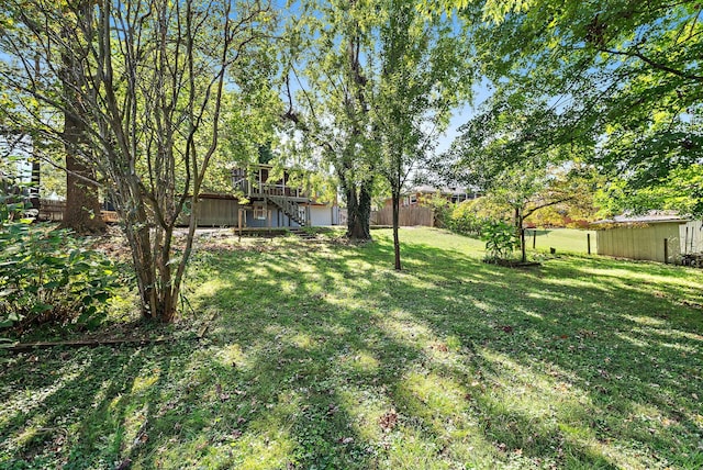 view of yard featuring a deck