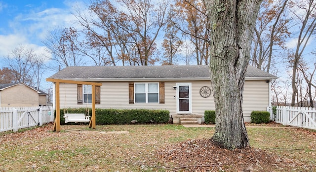 ranch-style house with a front yard