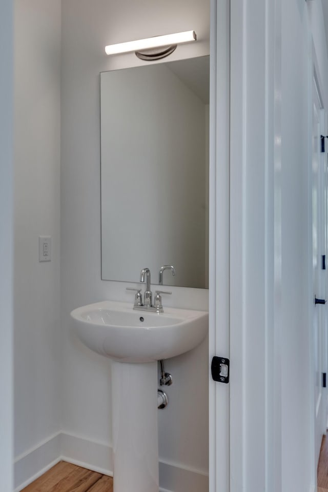 bathroom featuring hardwood / wood-style flooring