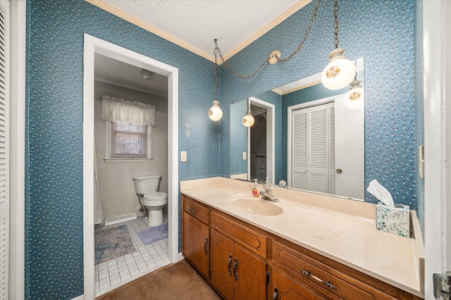 bathroom featuring vanity, tile patterned floors, toilet, ornamental molding, and a textured ceiling