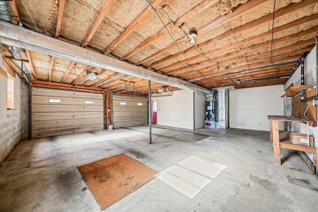 garage featuring heating unit