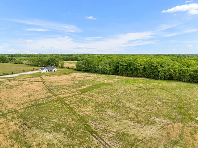 birds eye view of property featuring a rural view