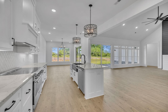 kitchen with white cabinetry, light hardwood / wood-style flooring, and appliances with stainless steel finishes