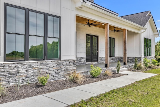 view of exterior entry with ceiling fan and french doors