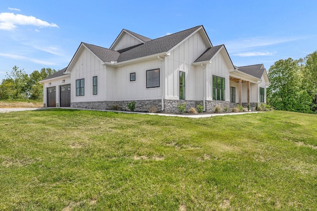 view of property exterior with a garage and a lawn