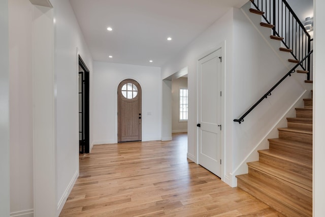 foyer with light hardwood / wood-style floors