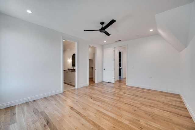 interior space with ceiling fan and light hardwood / wood-style floors