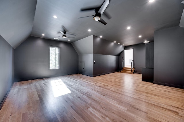 bonus room featuring ceiling fan, lofted ceiling, and light hardwood / wood-style floors