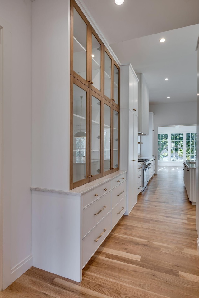 hallway with light wood-type flooring