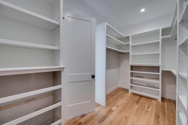 walk in closet featuring light wood-type flooring