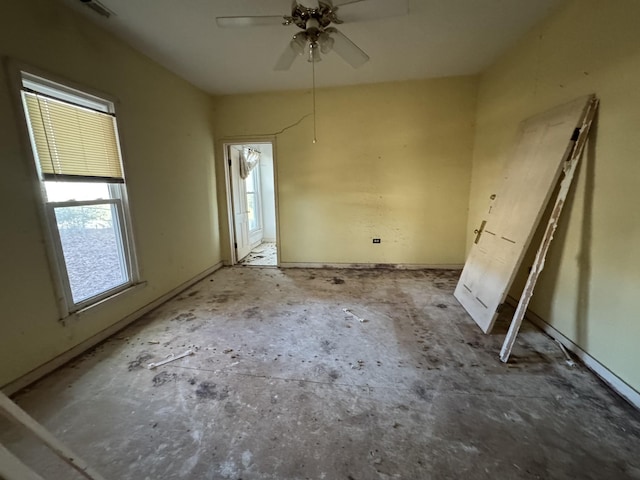 unfurnished room with ceiling fan